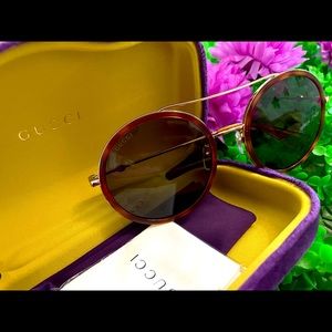 Gucci Rounded Women’s Sunglasses